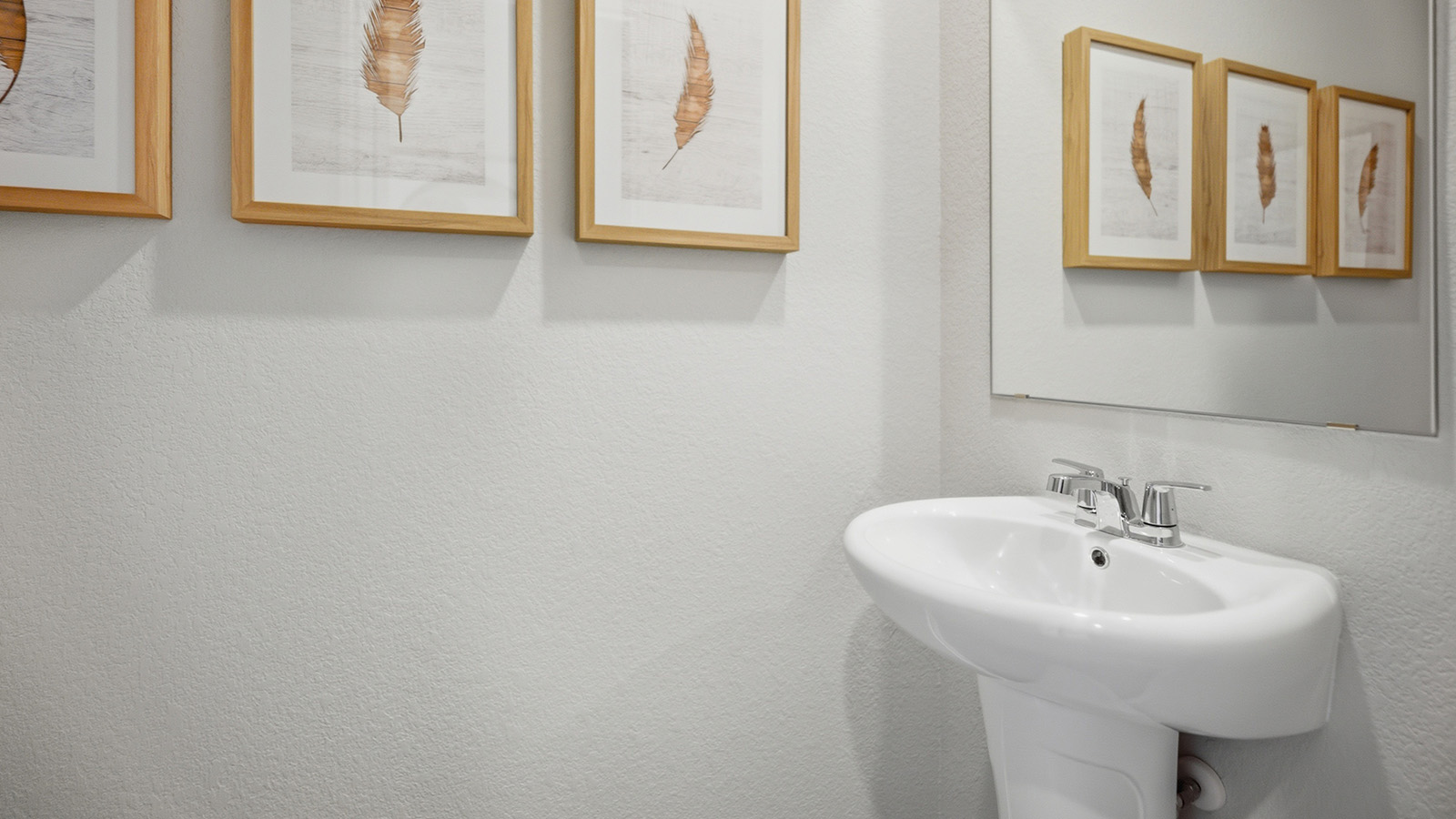 Cool Water model secondary bathroom with vanity sink.