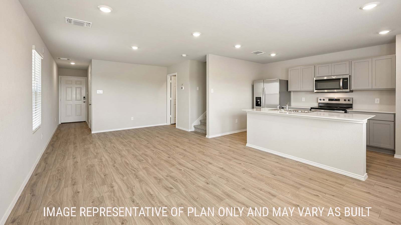 Gardenia dining room with view of open concept kitchen and living room.