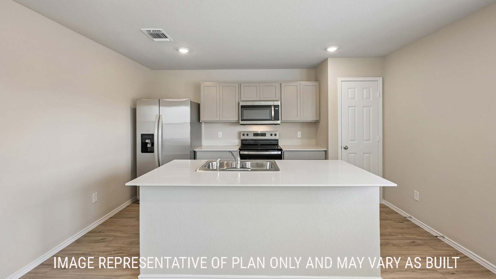Gardenia kitchen with kitchen island with grey cabinets and granite countertops.