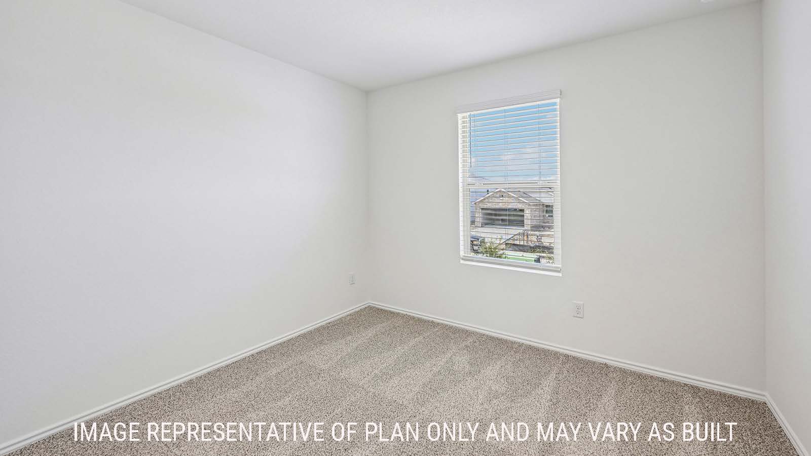 Hibiscus secondary bedroom with carpeted flooring and window for natural lighting.