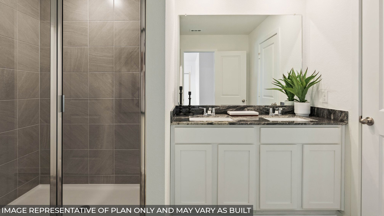 Hibiscus primary bathroom with vanity sink and walk-in shower.