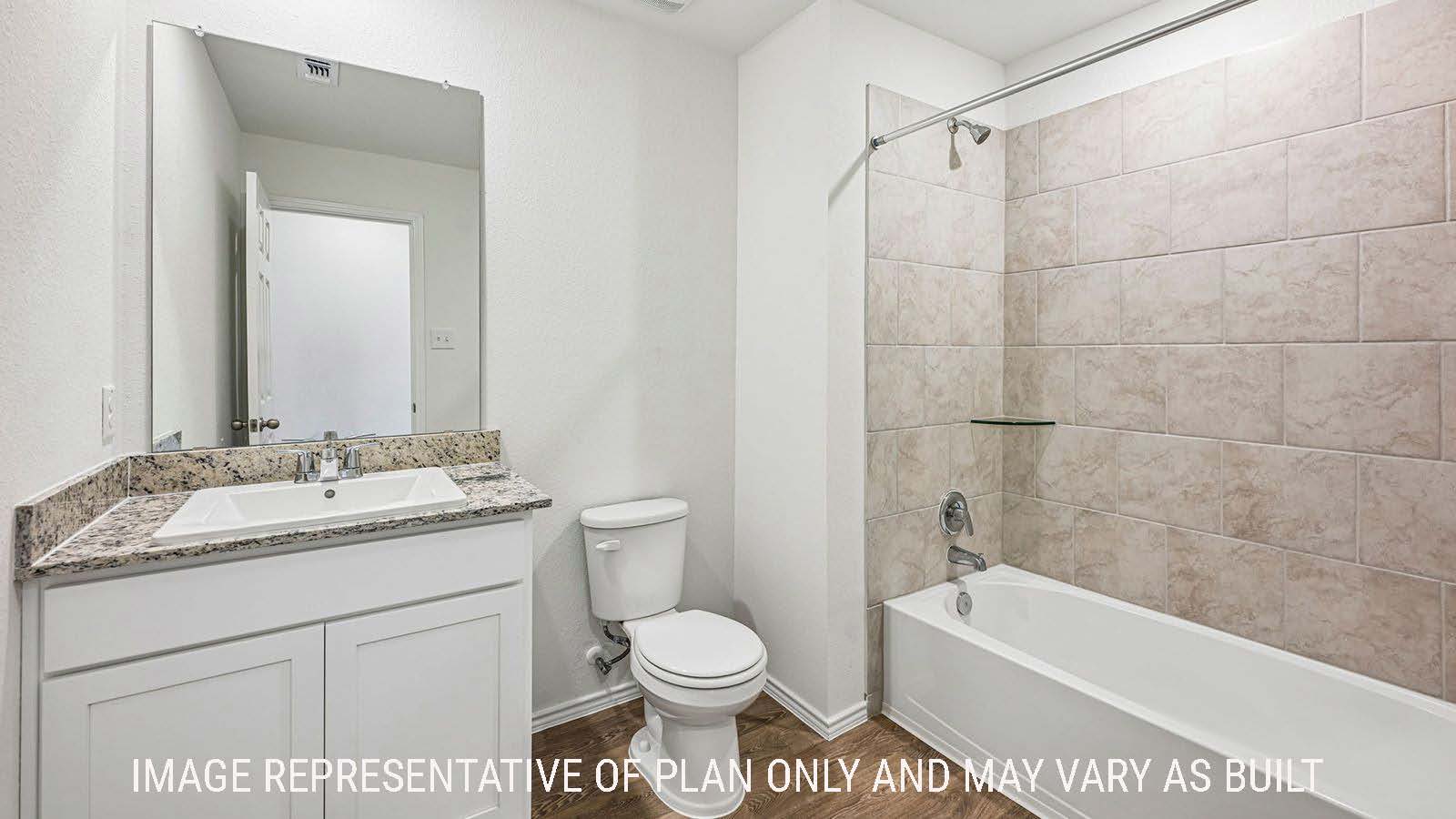 Hibiscus secondary bathroom with vanity sink and shower and tub combo.