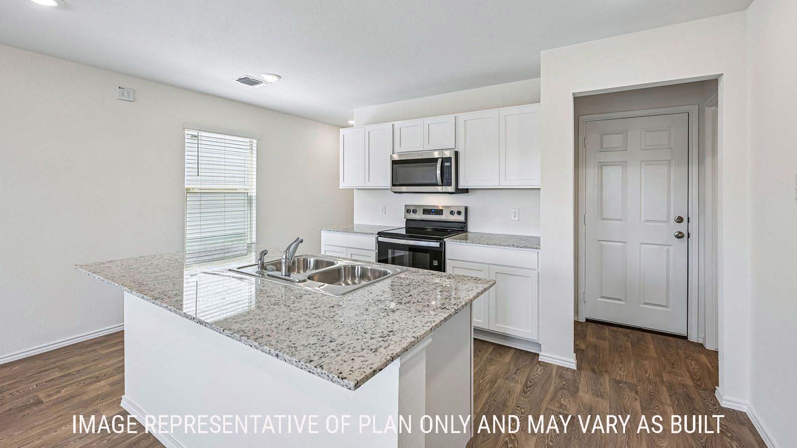 Hibiscus kitchen with kitchen island and light cabinets and granite countertops.