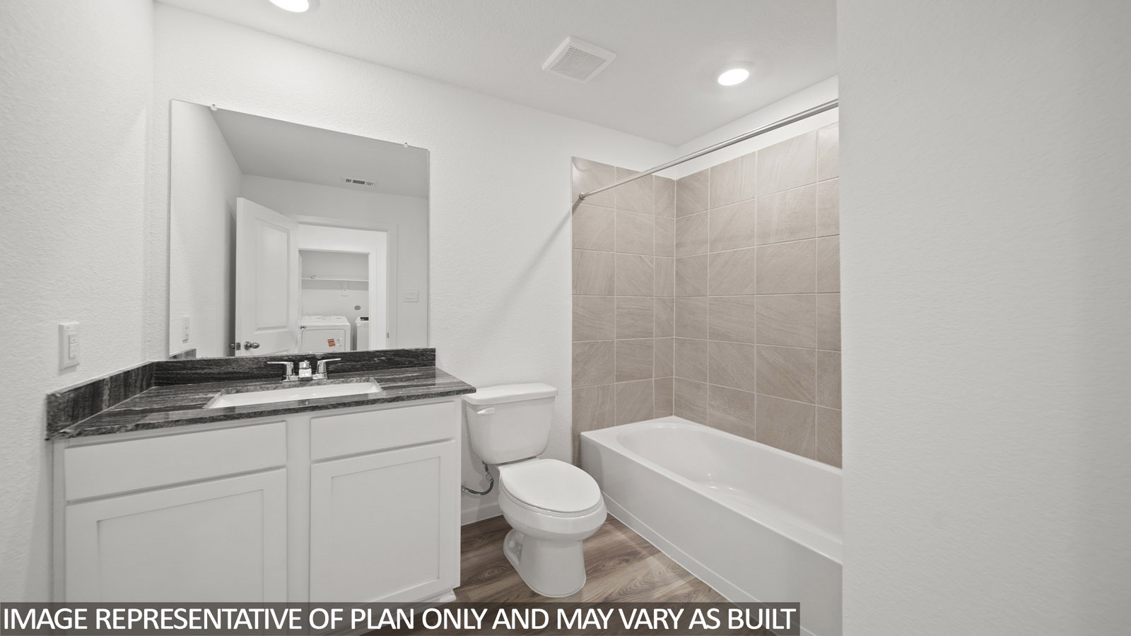 Iris secondary bathroom with vanity sink and shower and tub combo.