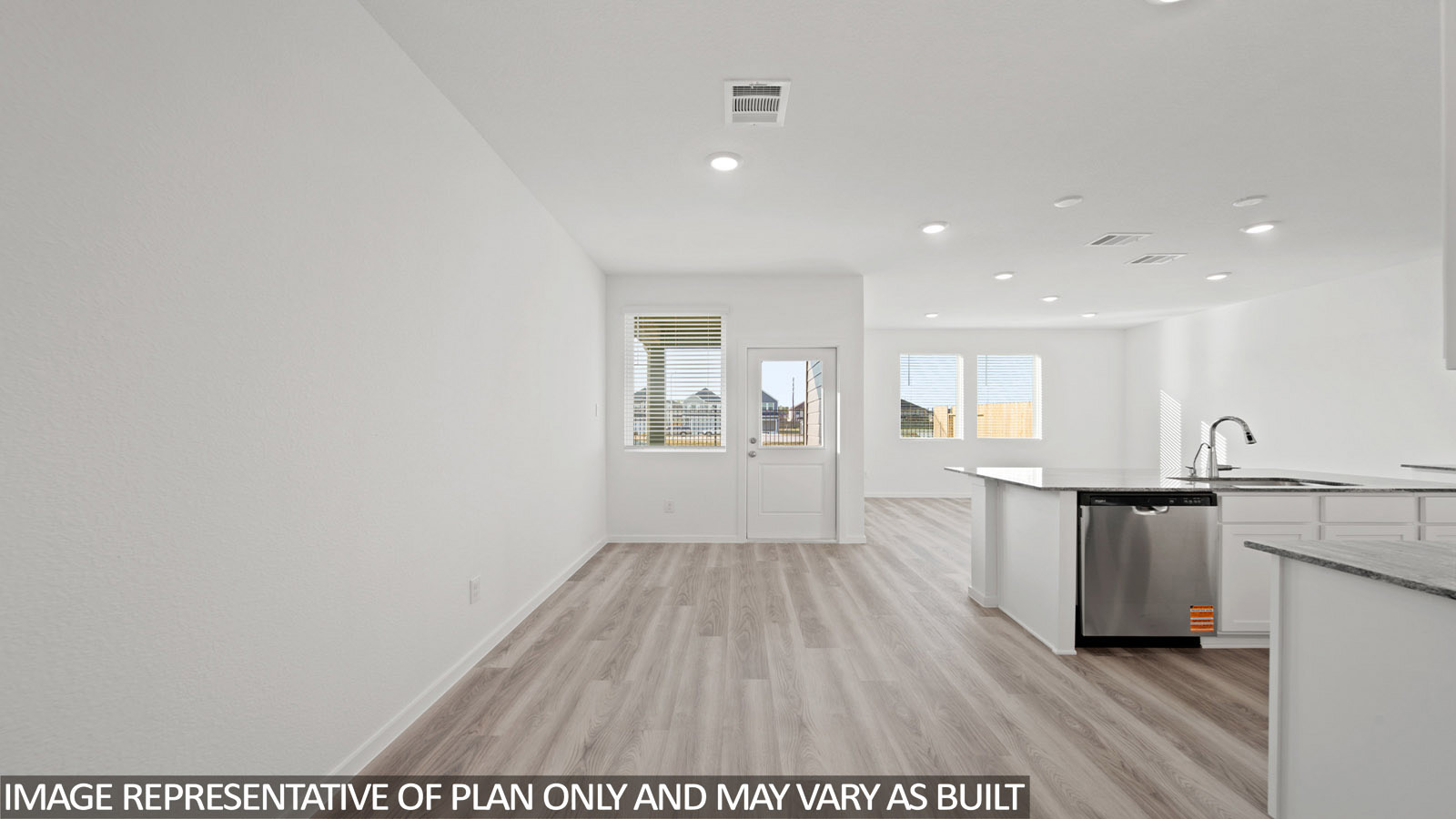 Iris living room with vinyl plank flooring and view of open concept kitchen and dining room.