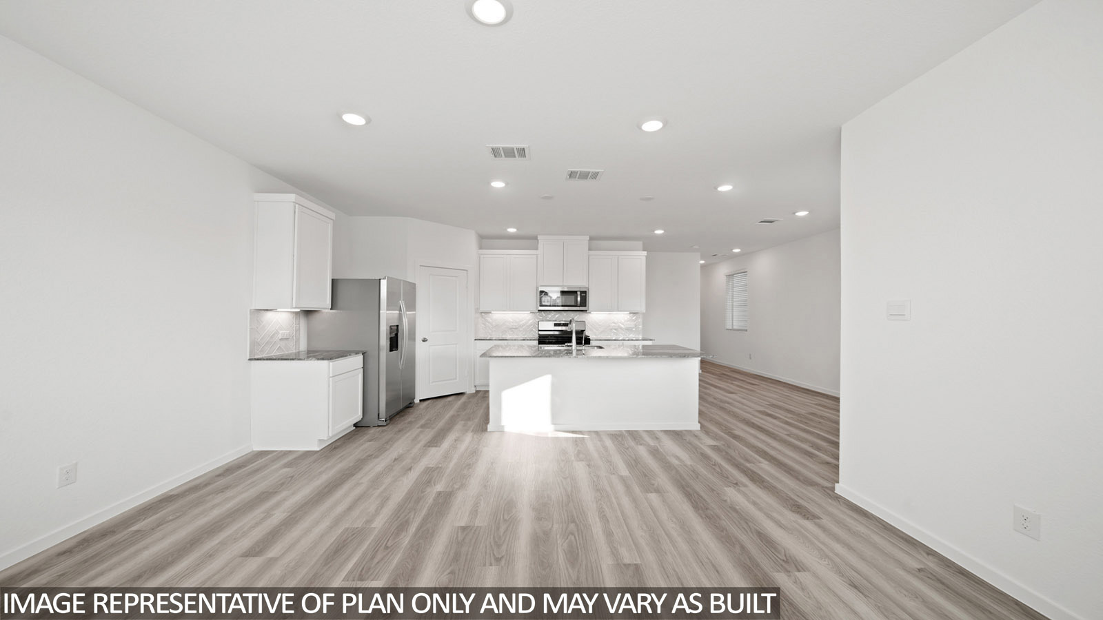 Iris living room with vinyl plank flooring and view of open concept kitchen and dining room.