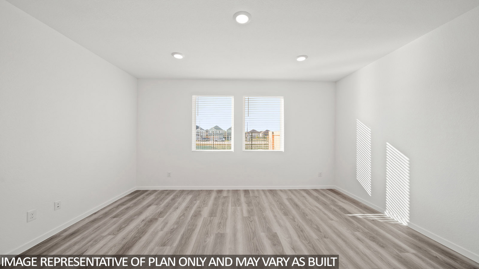 Iris living room with vinyl plank flooring and windows for natural lighting.