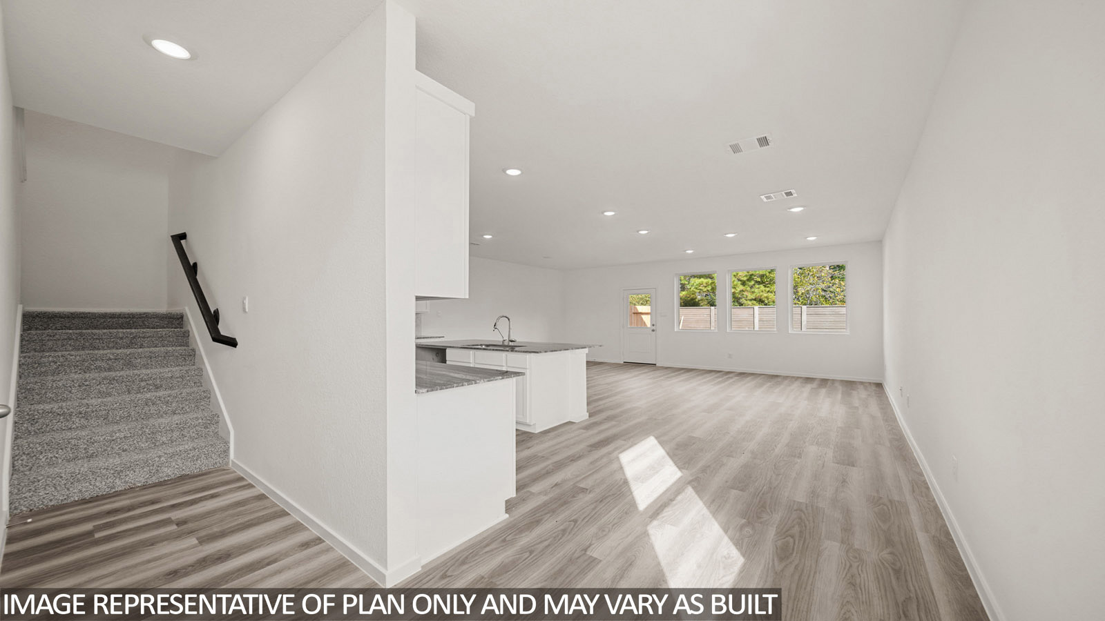 Jasmine front hallway with view of open concept kitchen, living room and dining room.