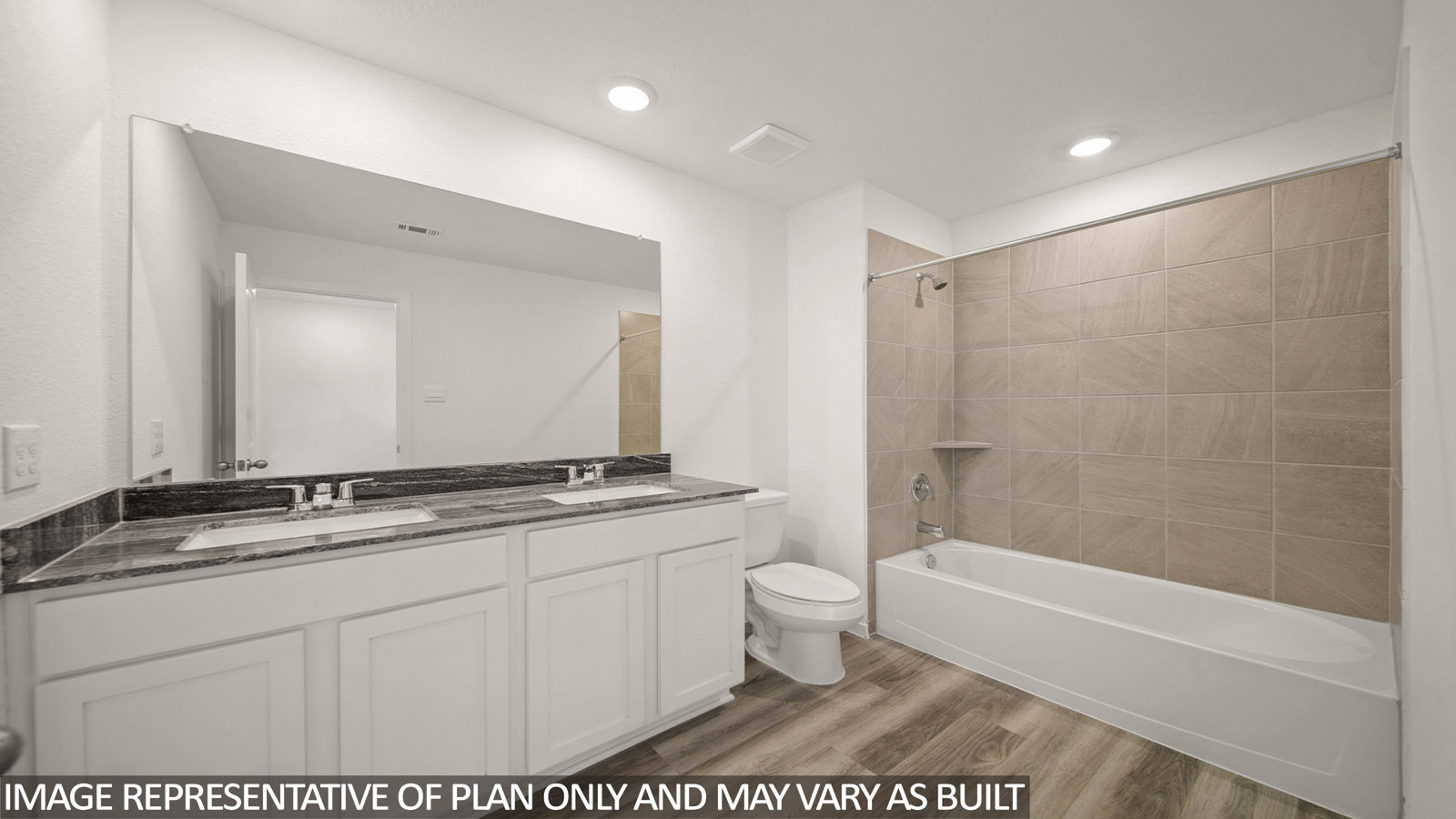 Jasmine secondary bathroom with vanity sink and shower and tub combo.