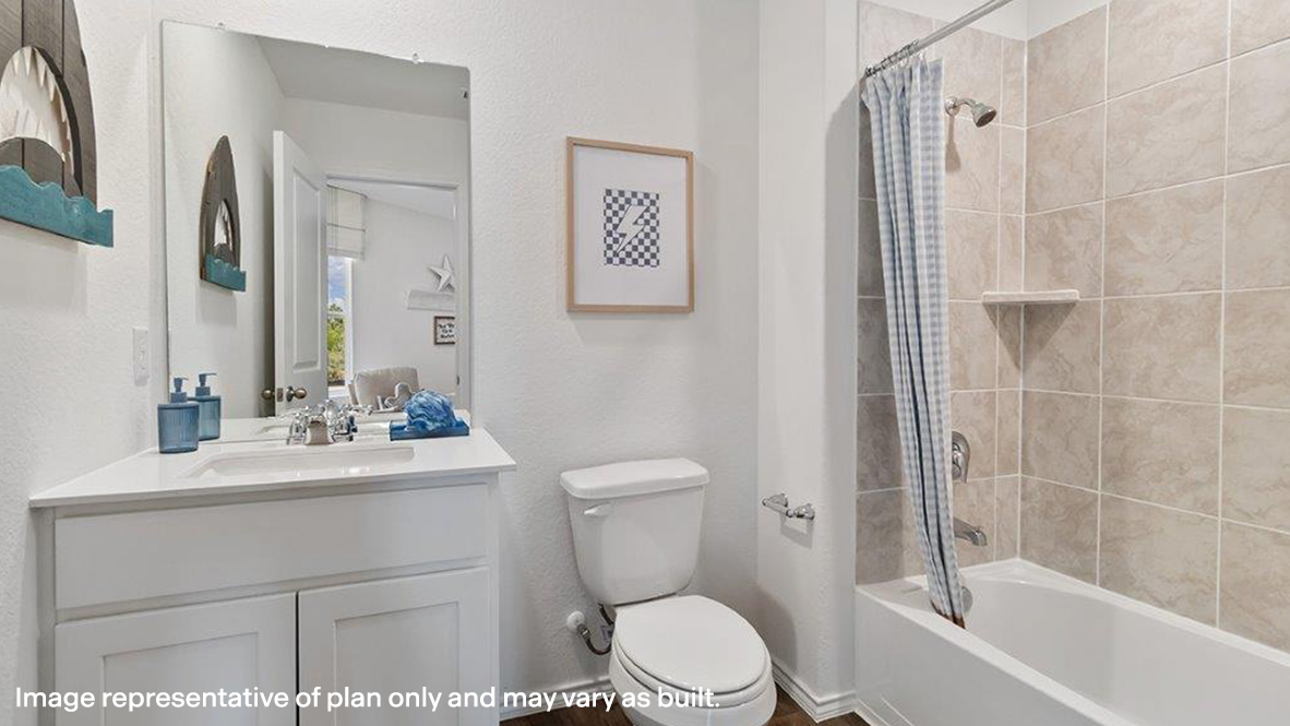 Franklin secondary bathroom with single vanity and bath tub and shower combo.