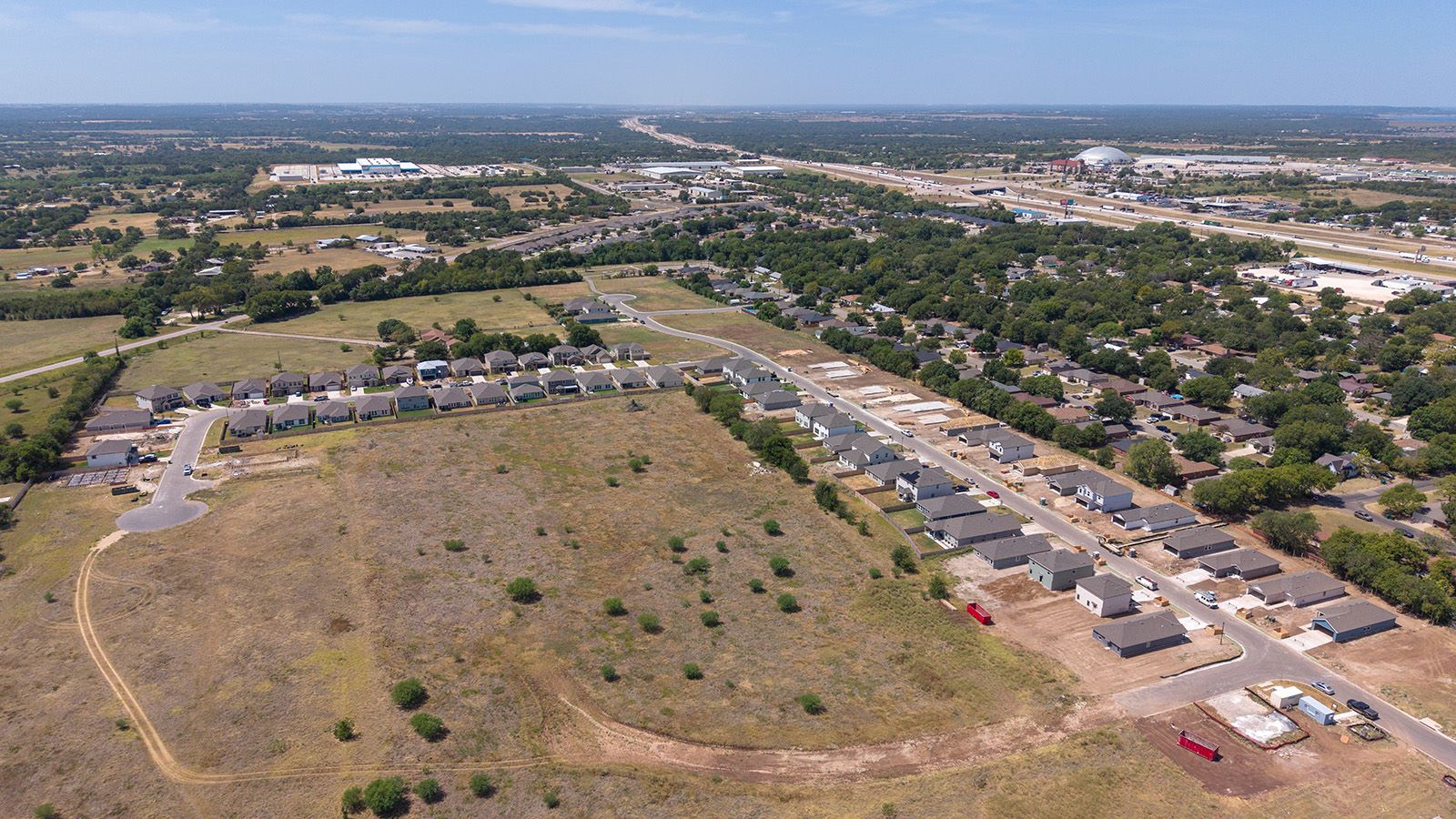 Hidden Trails Model Home exterior ariel shot of community.