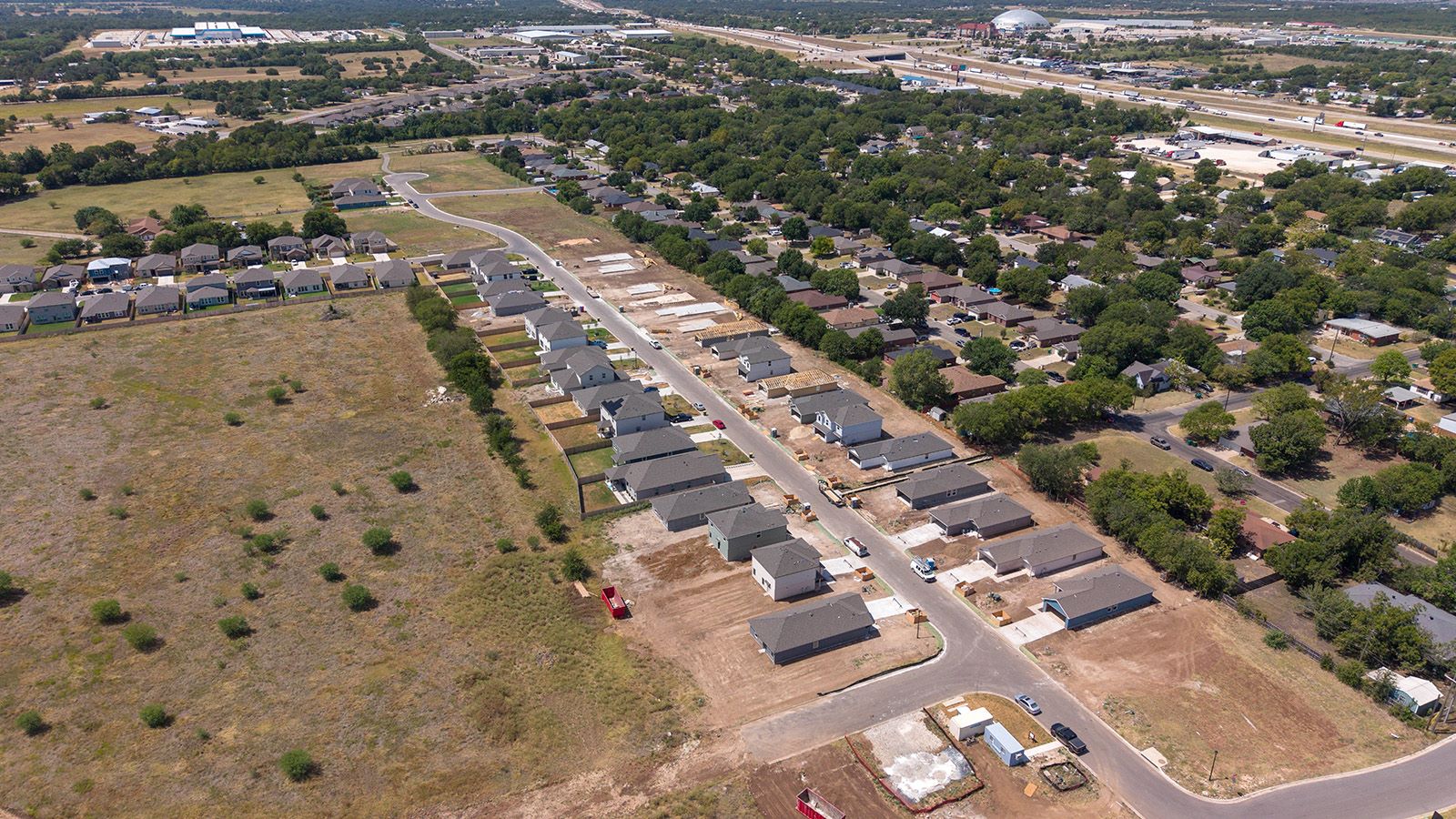 Hidden Trails Model Home exterior ariel shot of community.