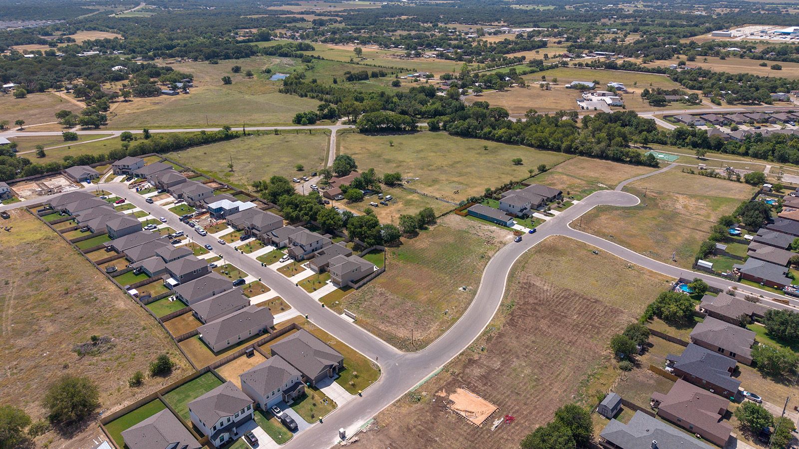 Hidden Trails Model Home exterior ariel shot of community.