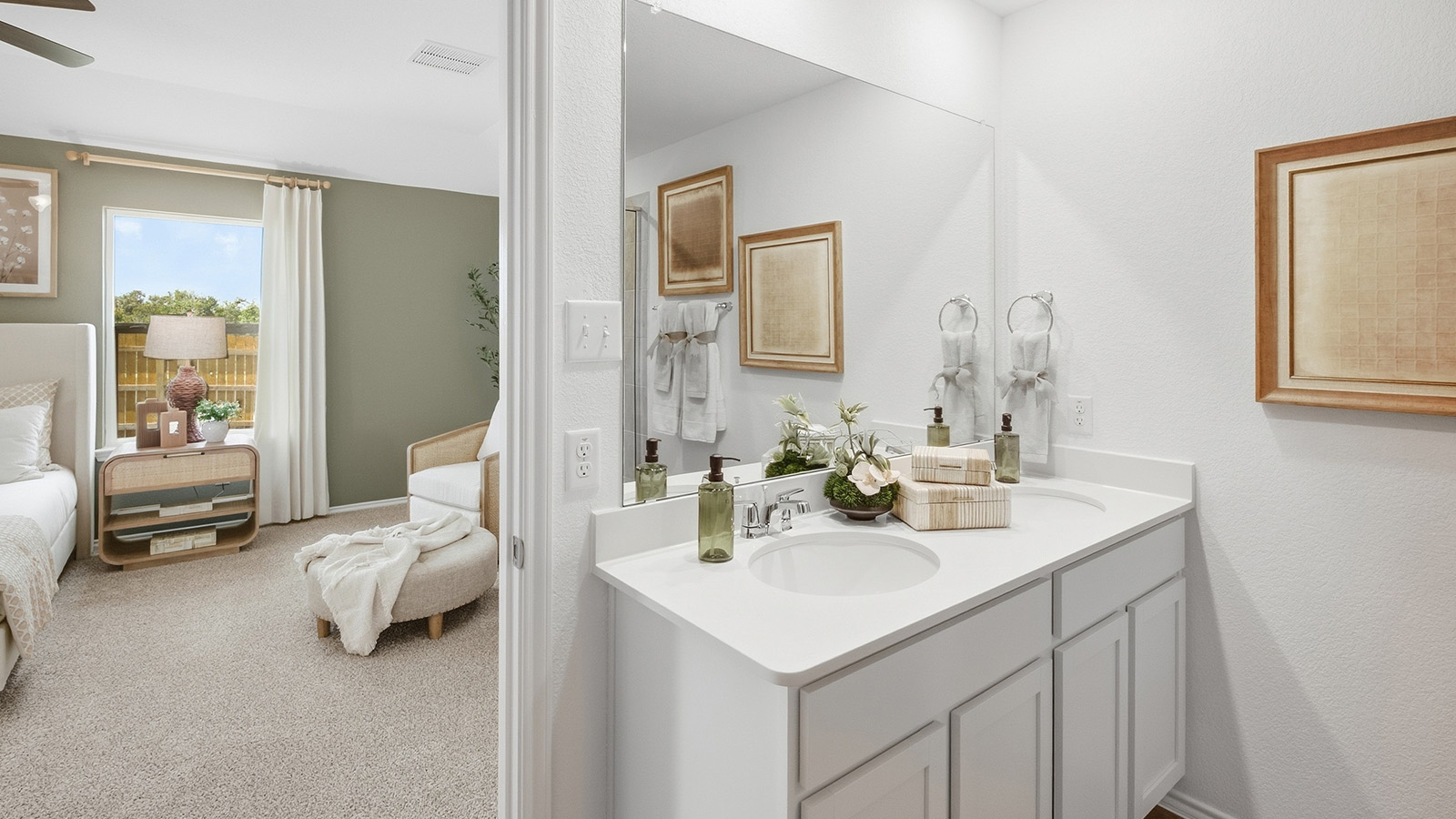 Wildwood Model primary bathroom with vanity sink and view of primary bathroom.
