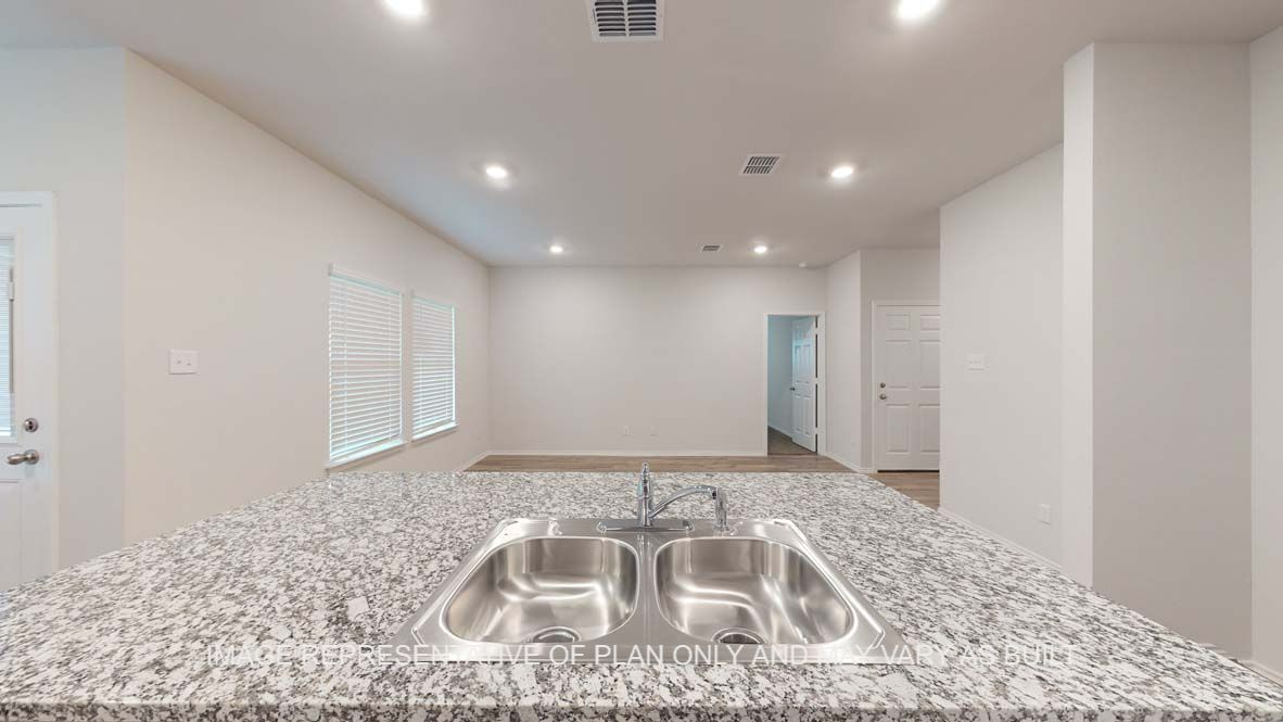 Ashburn kitchen with center kitchen island with granite countertops.