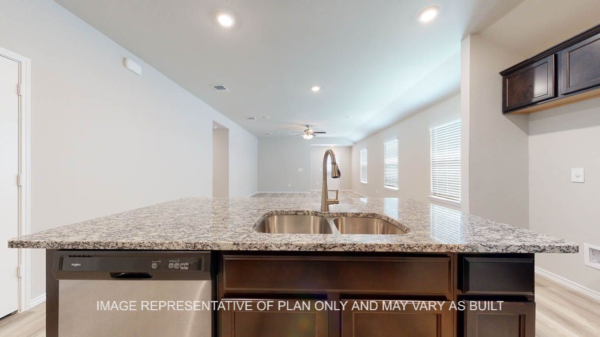 Seabrook large kitchen island with granite countertops.