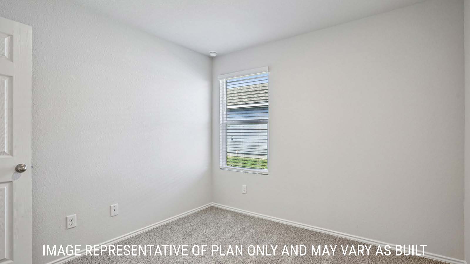 Barton secondary bedroom with carpeted flooring and window for natural lighting.