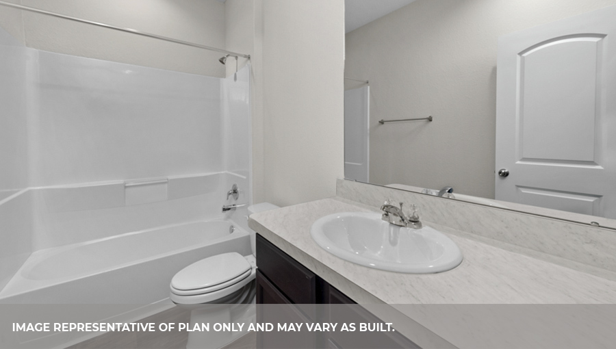 Secondary bathroom with tub/shower combo.