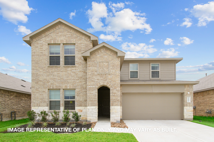 Two-story house with tan and cream details.