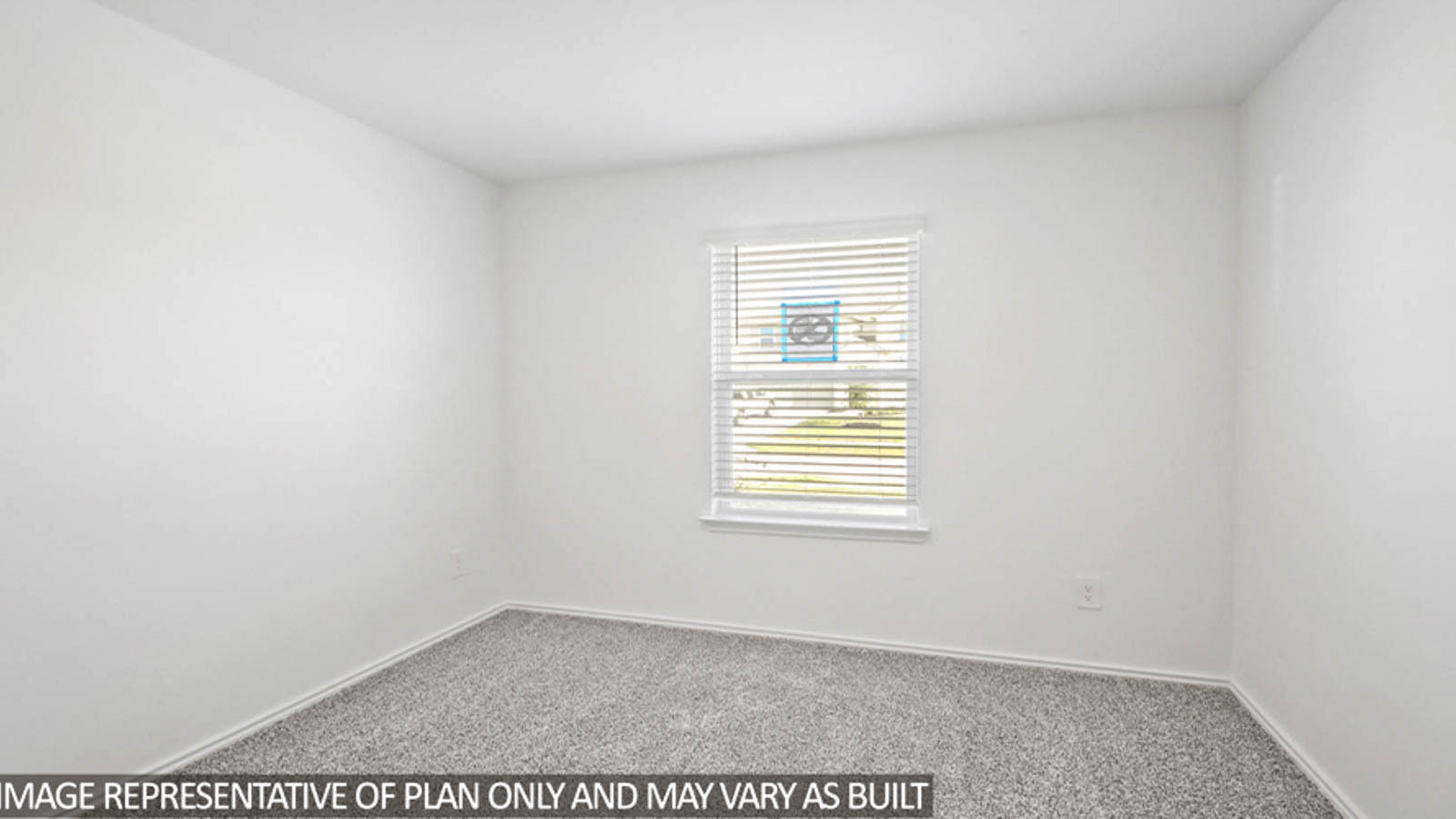Secondary bedroom with shag carpet flooring and bright window