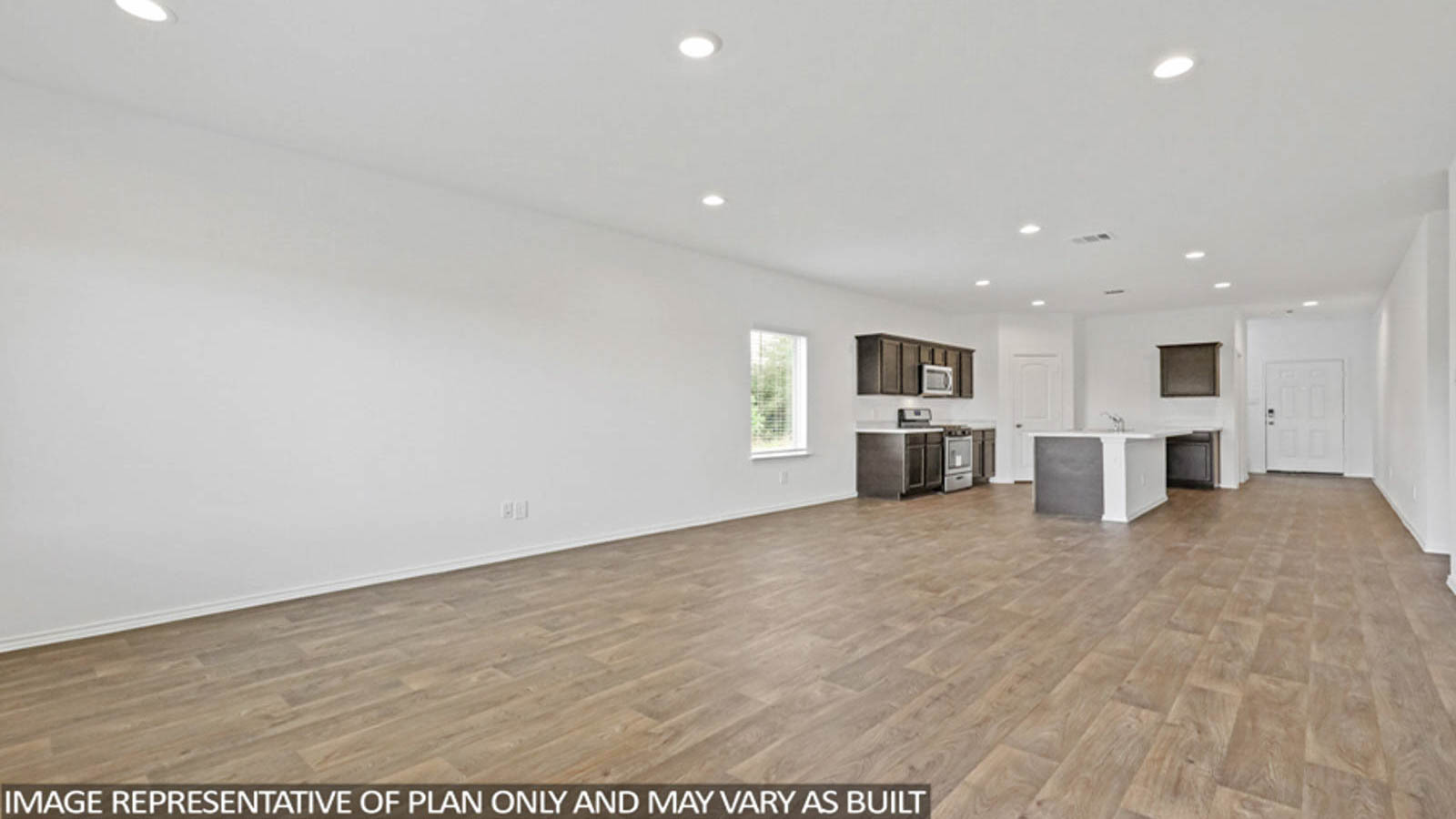 Spacious living area with vinyl flooring and bright windows in Conroe TX