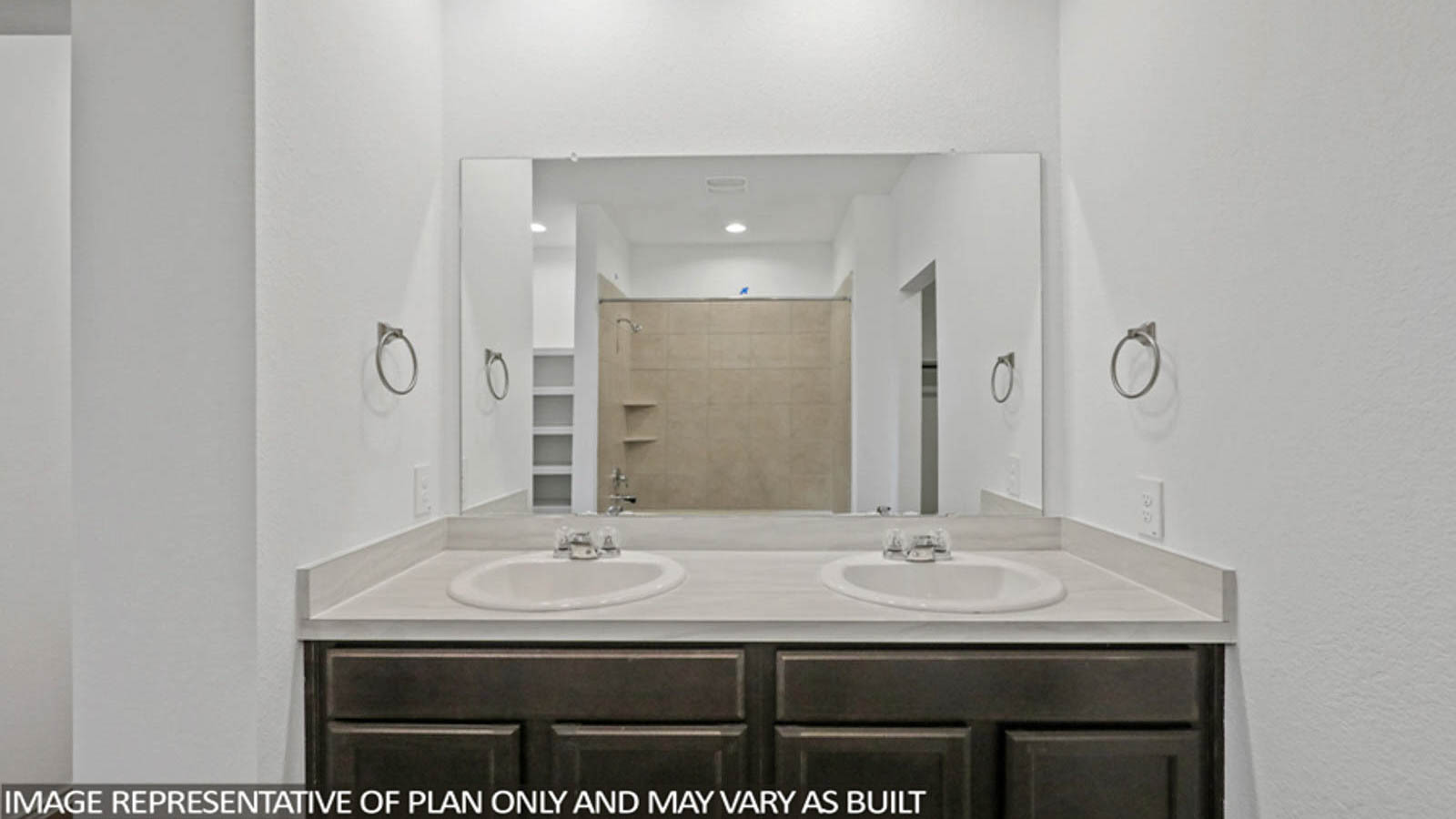 Primary bathroom with soaker tub and tile shower with semi frameless glass in Conroe TX