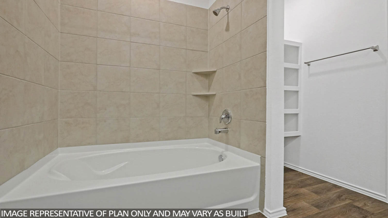 Primary bathroom with soaker tub and tile shower with semi frameless glass in Conroe TX