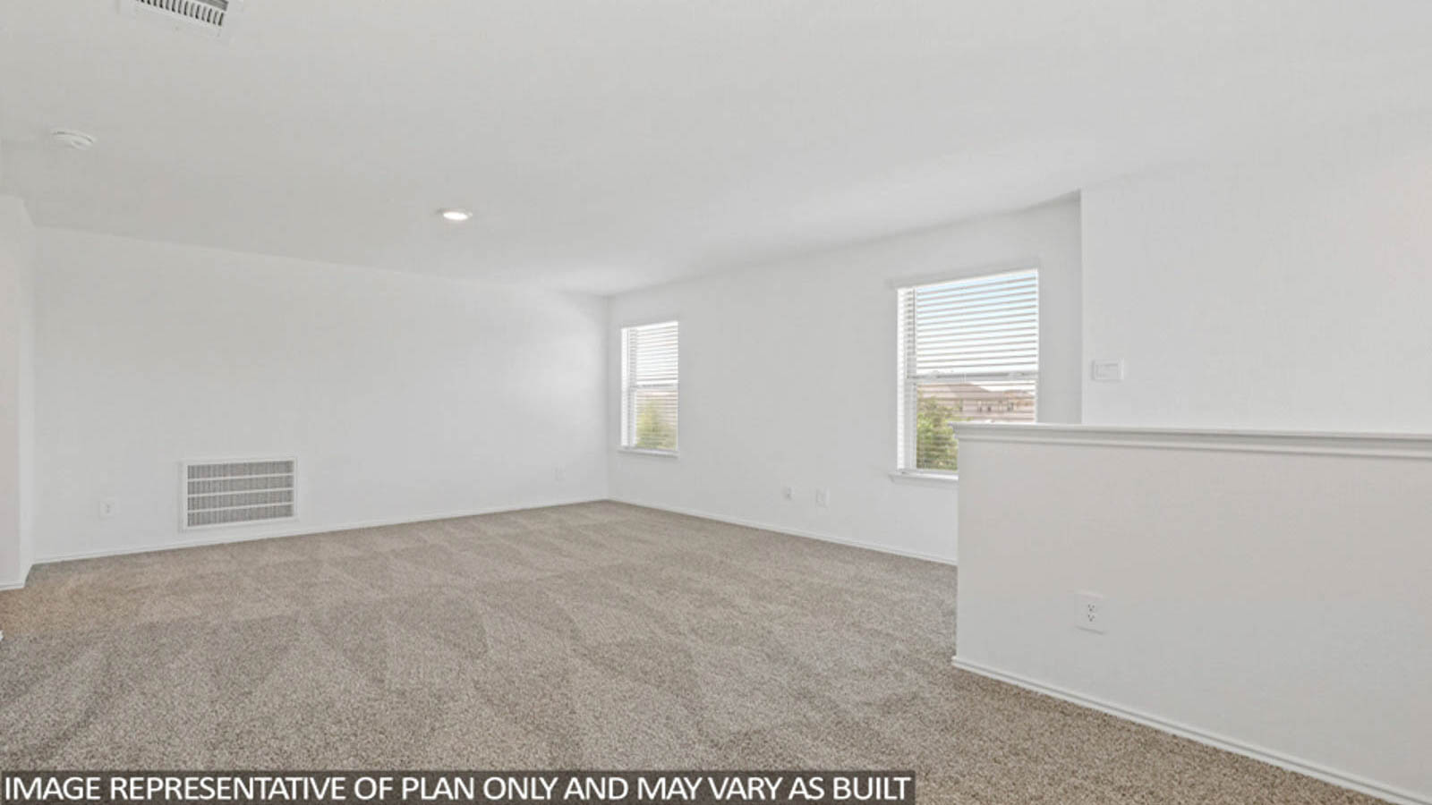Second story game room with carpet flooring with bright windows in this multi functional space in Conroe TX
