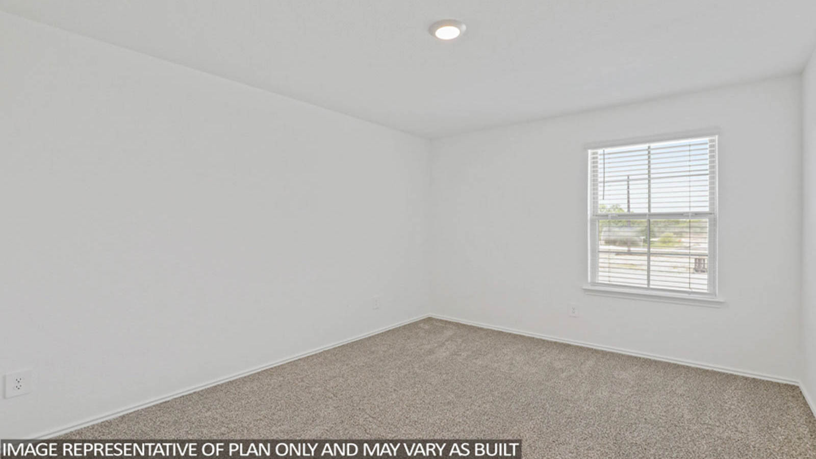 Second level secondary bedroom with carpet flooring and bright window