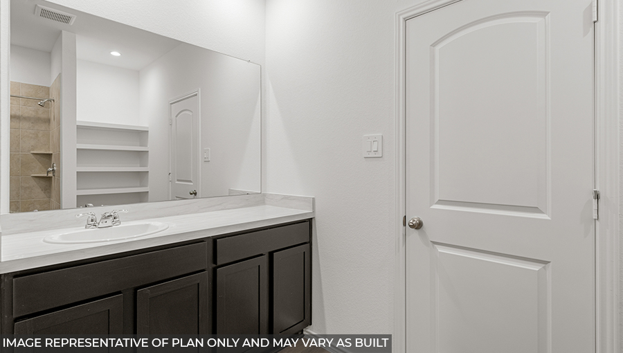Primary bathroom with double sinks with quartz counter tops in Conroe  TX