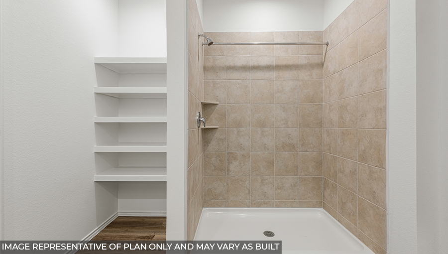 Primary bathroom with stand-alone shower with tiles and semi frameless glass in Hills of Westlake