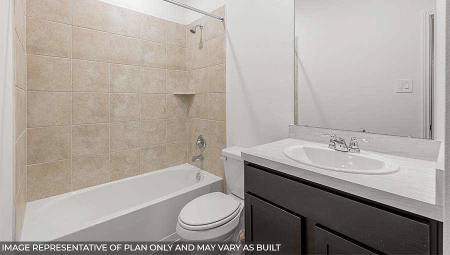Secondary bathroom with tub/shower combo with quartz counter tops in Conroe TX