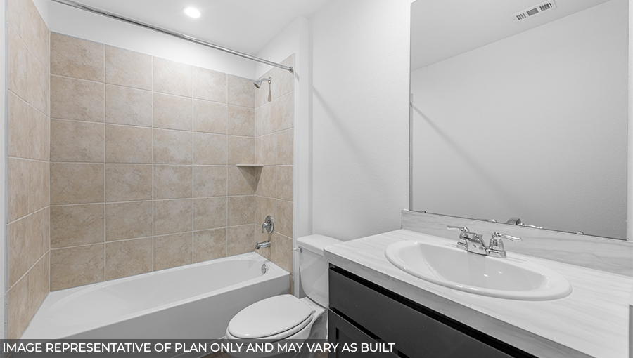 Secondary bathroom with tub/shower combo with quartz counter tops in Conroe TX