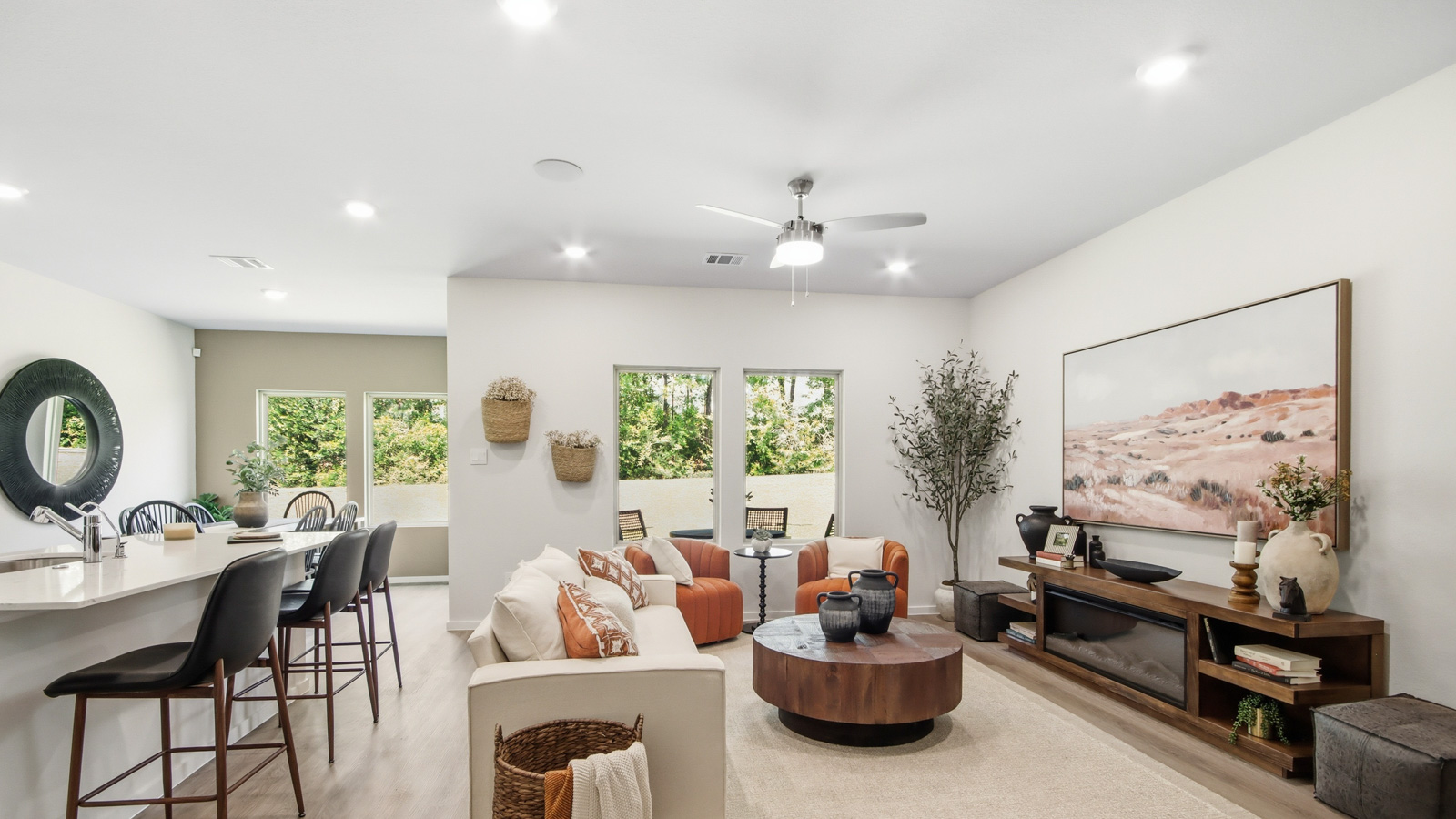 Spacious living area with vinyl flooring and bright windows in Willis TX