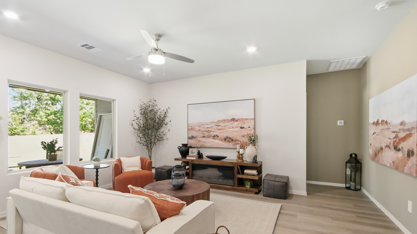 Spacious living area with vinyl flooring and bright windows in Willis TX