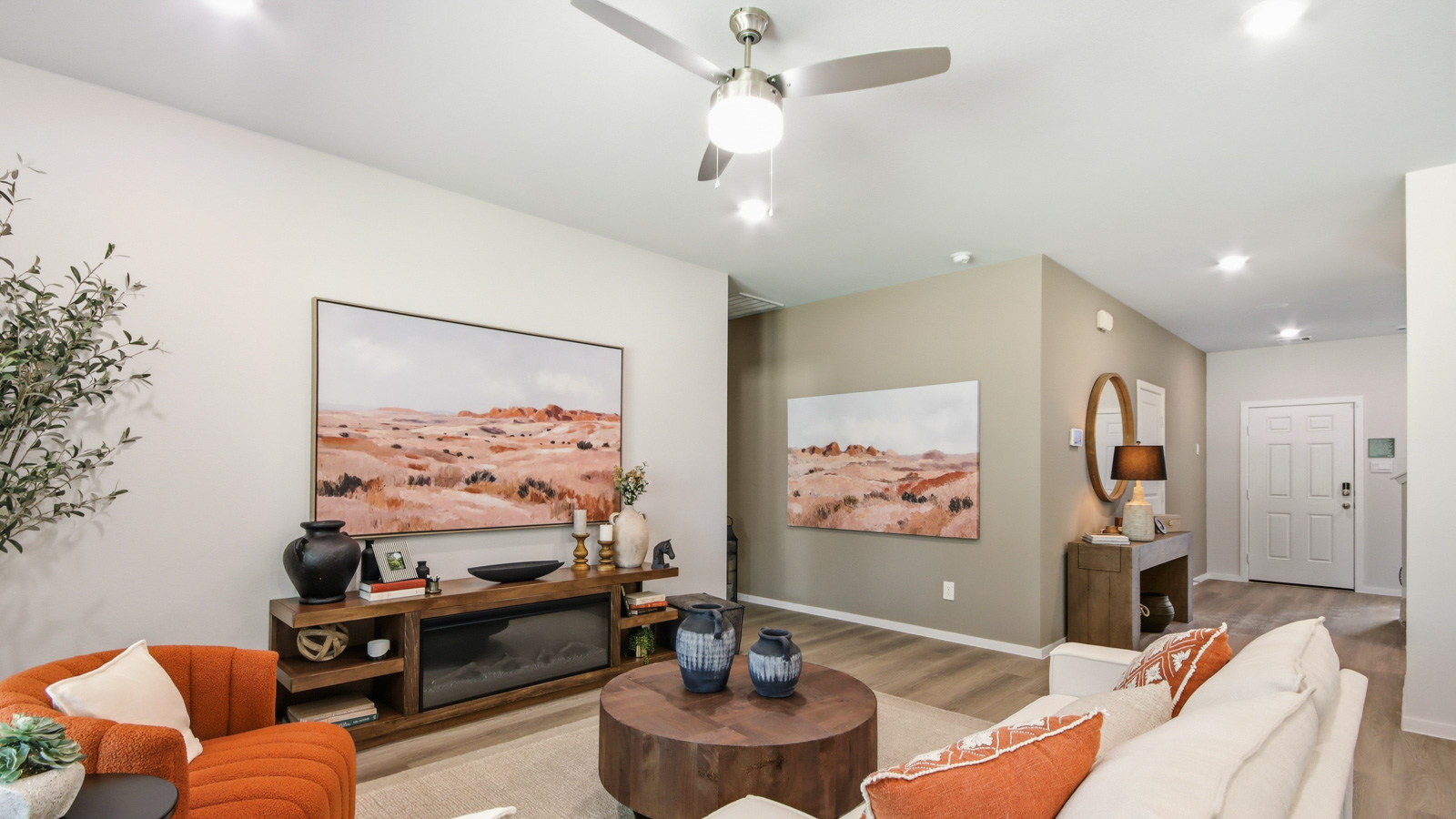 Spacious living area with vinyl flooring and bright windows in Willis TX