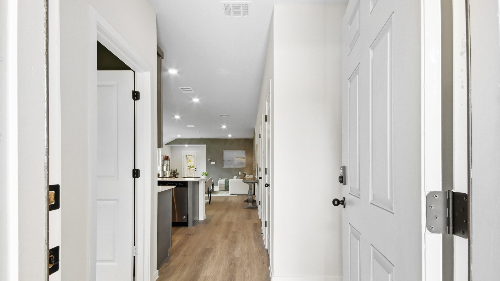 Entry hallway with vinyl flooring sherman williams painted walls