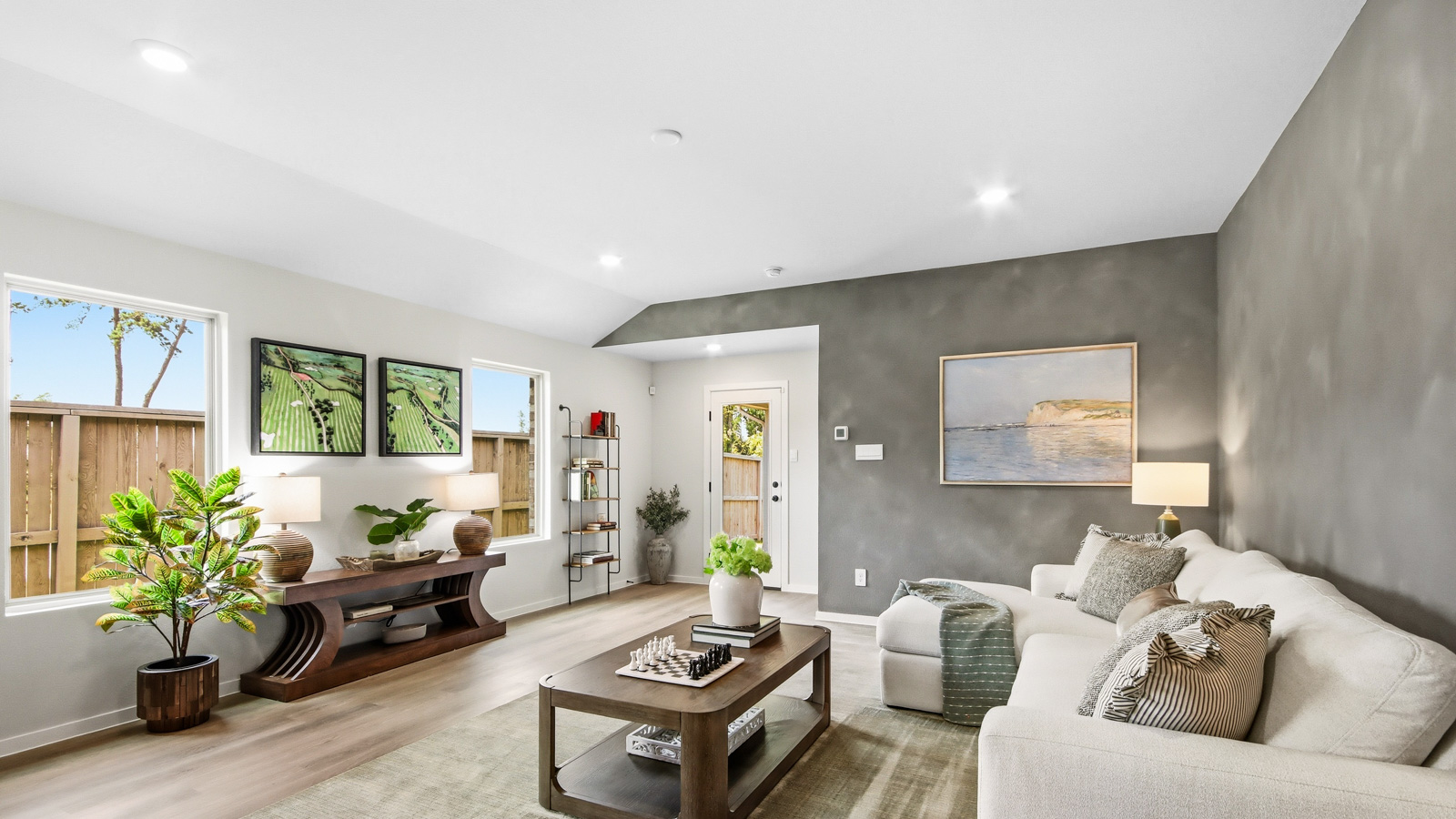Spacious living area with vinyl flooring and bright windows in Willis TX