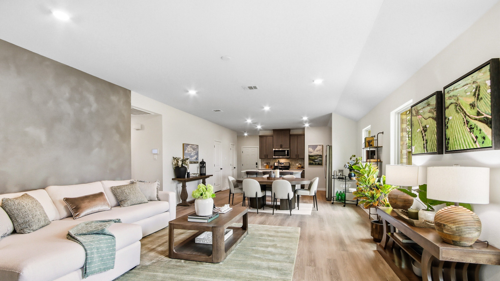 Spacious living area with vinyl flooring and bright windows in Willis TX