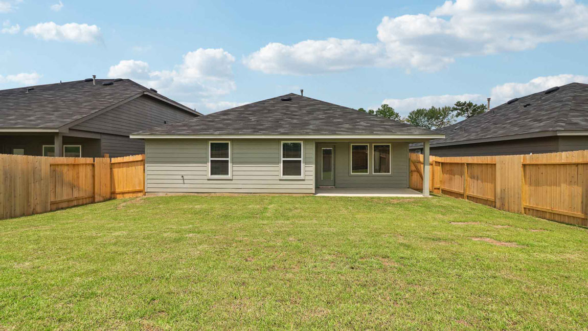 covered patio with jamies hardie siding and overhead lighting