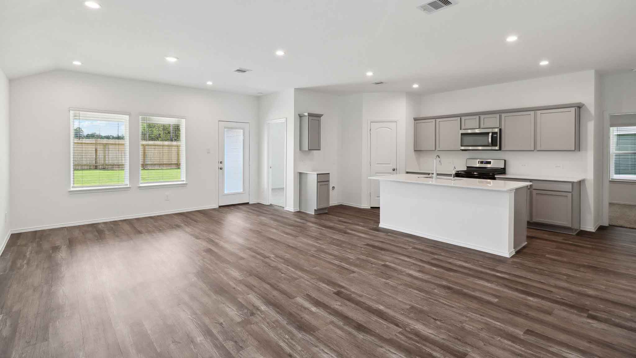 Open concept living and dining room.