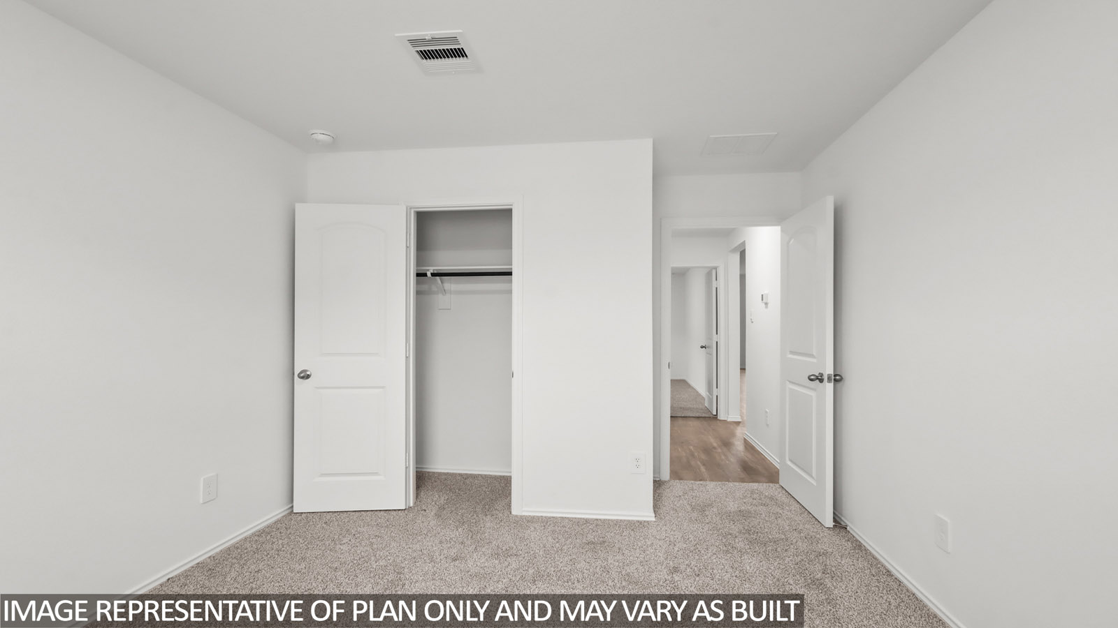 bedroom with window and carpet