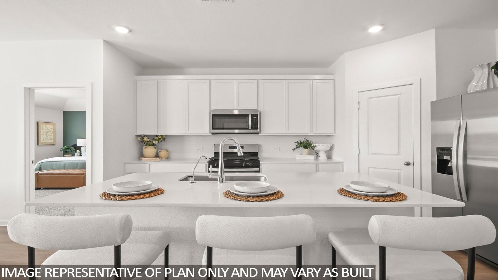 Kitchen with an island and vinyl floor