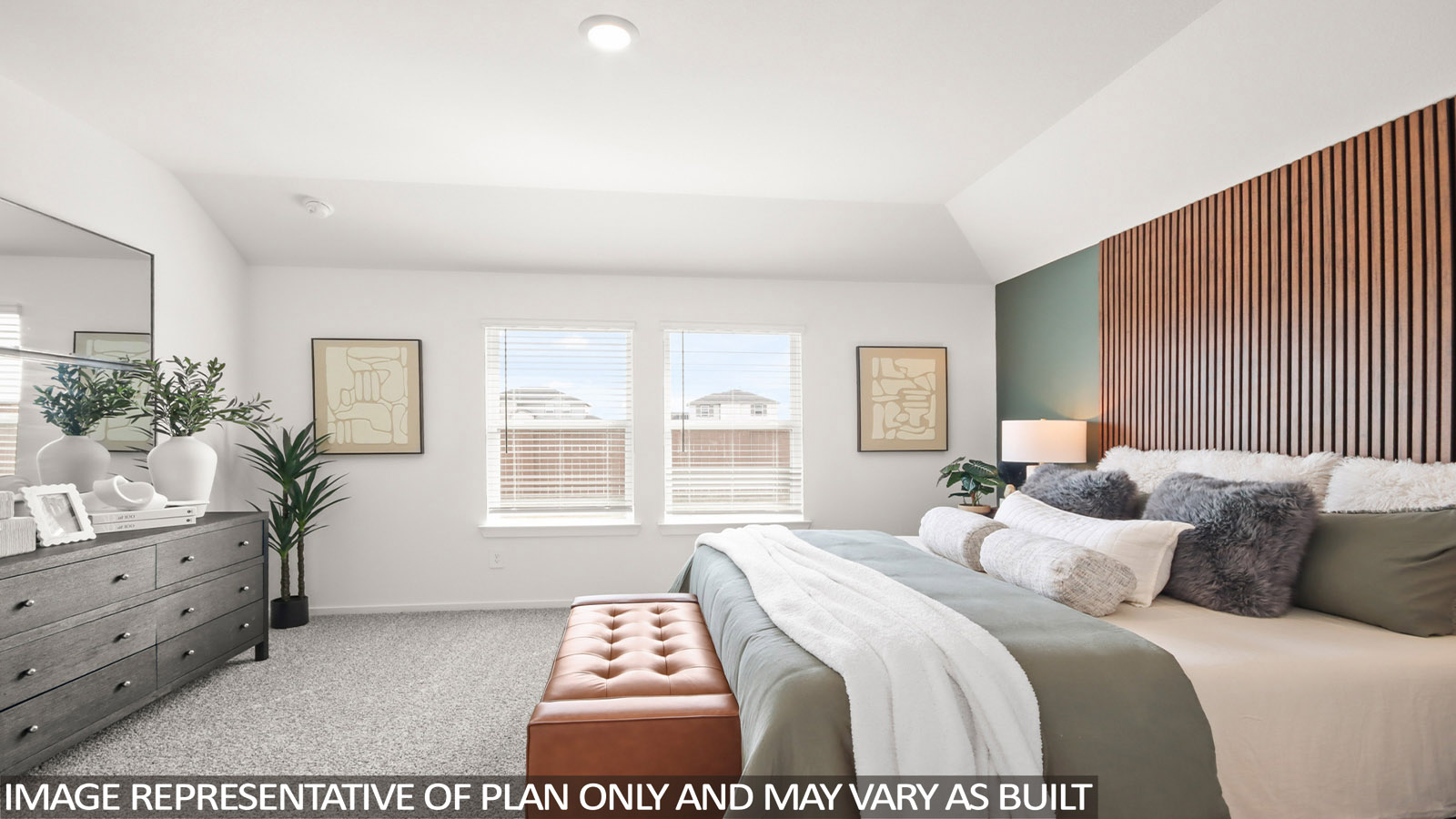 Primary bedroom with carpet flooring