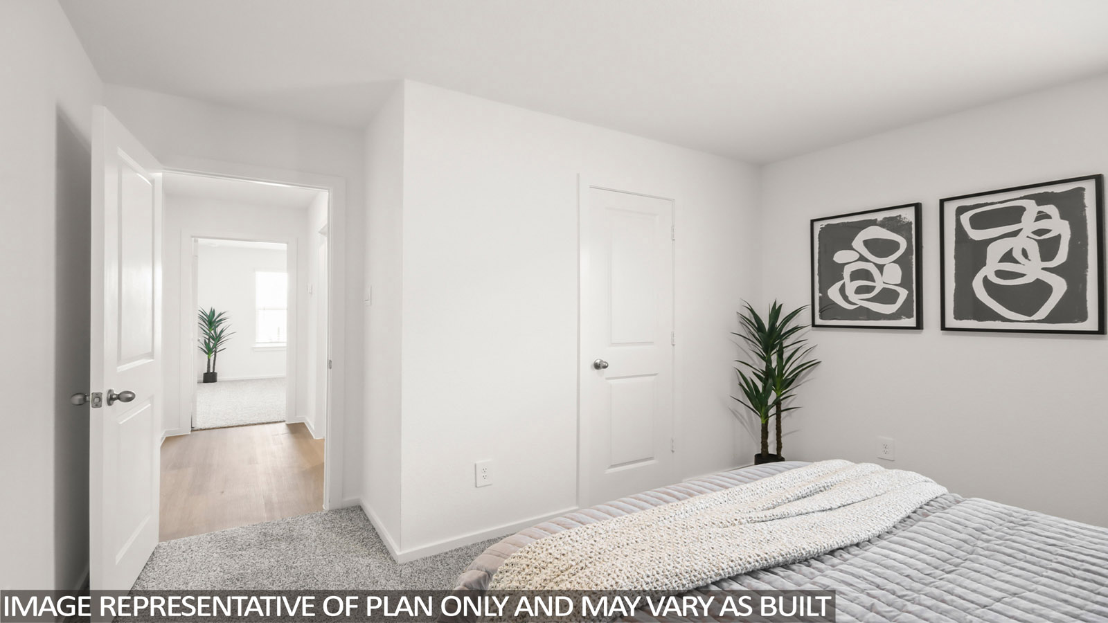 Secondary bedroom with carpet flooring