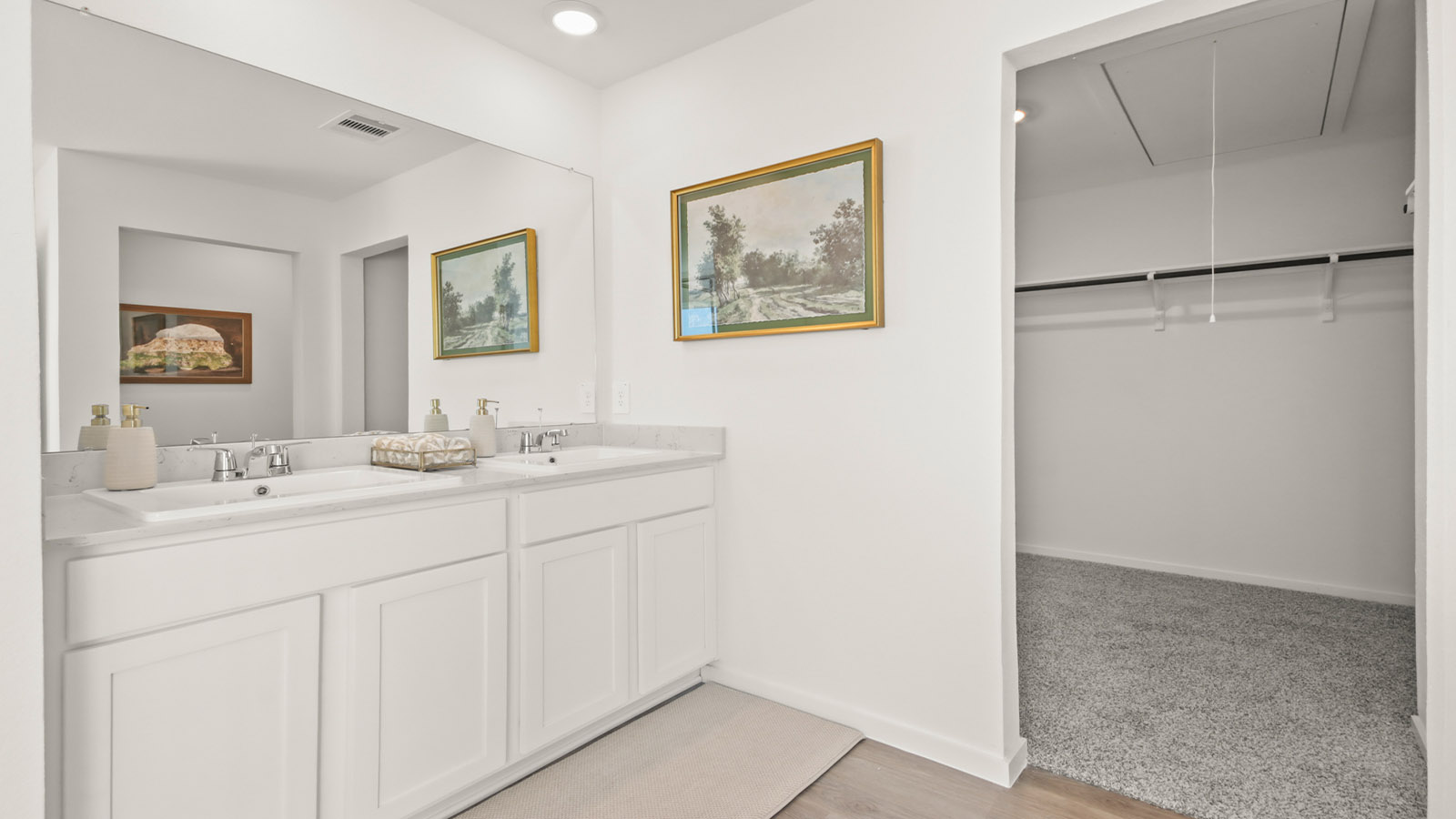 Primary bathroom with single sink with quartz counter tops in Magnolia TX