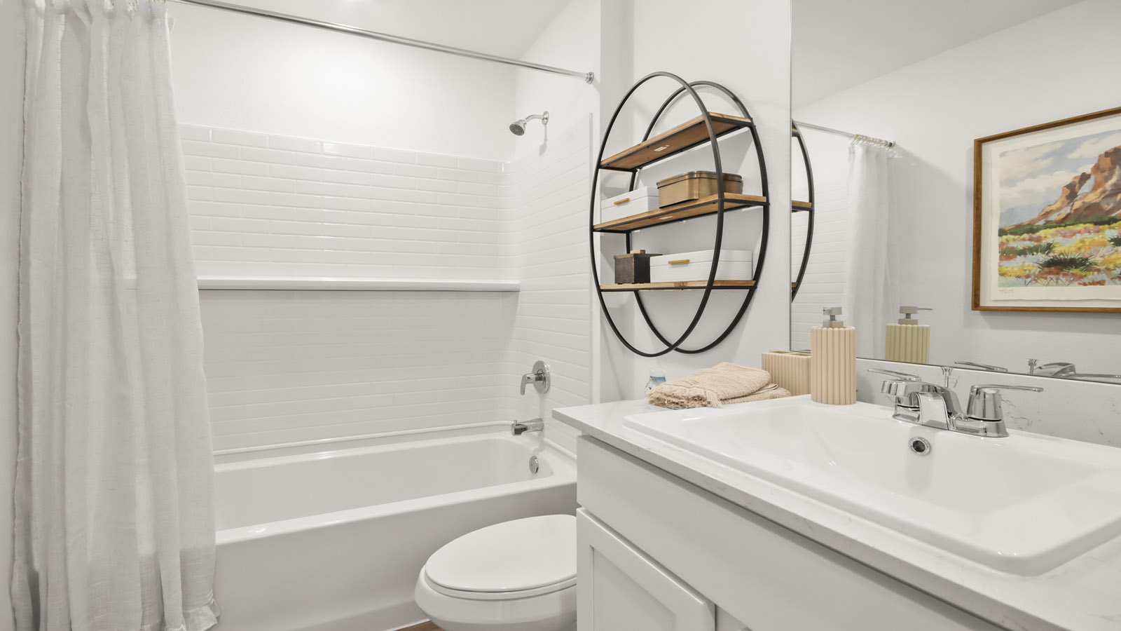 Secondary bathroom with tub/shower combo with quartz counter tops in Magnolia TX
