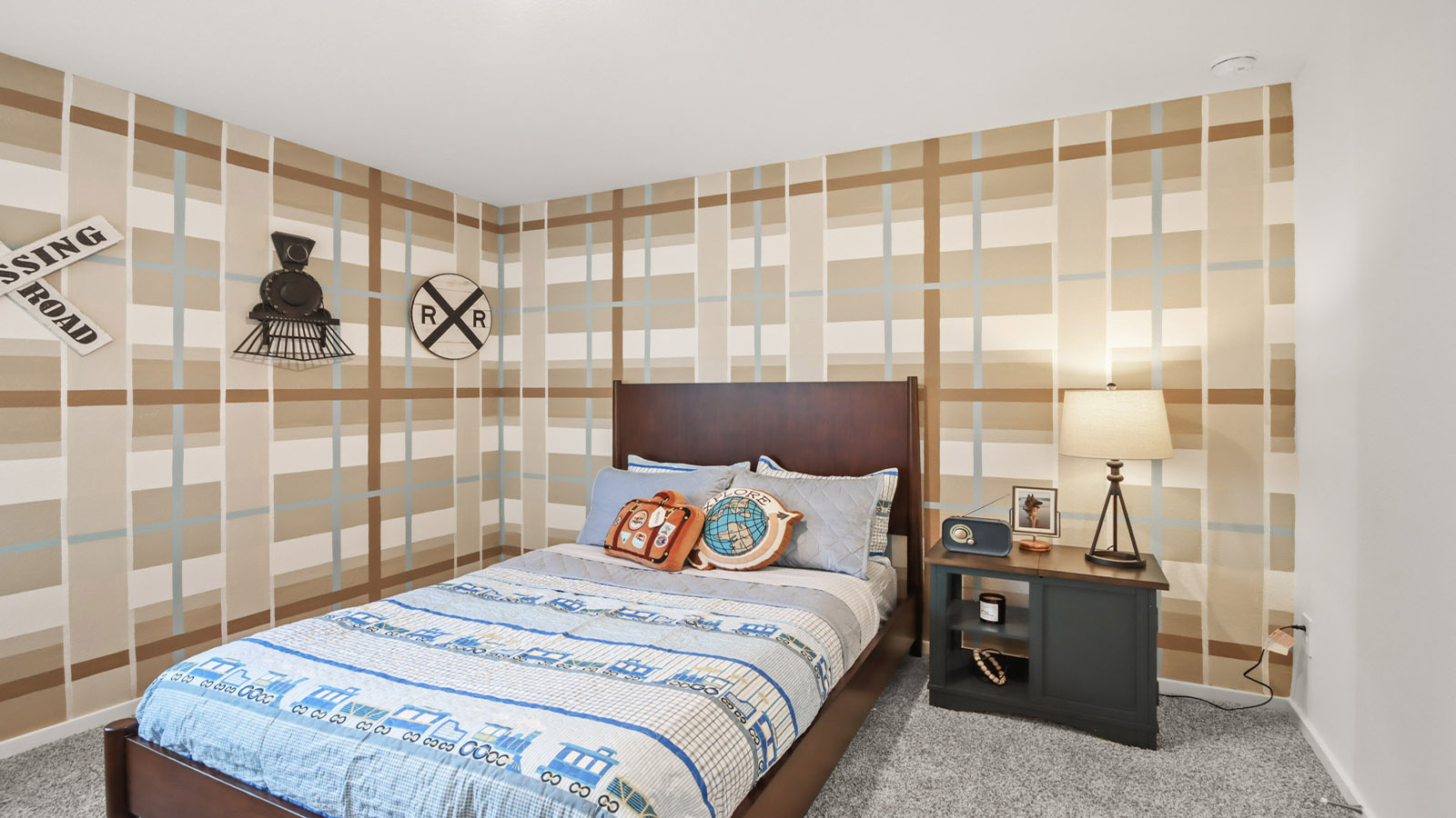 Secondary bedroom with shag carpet flooring and bright window