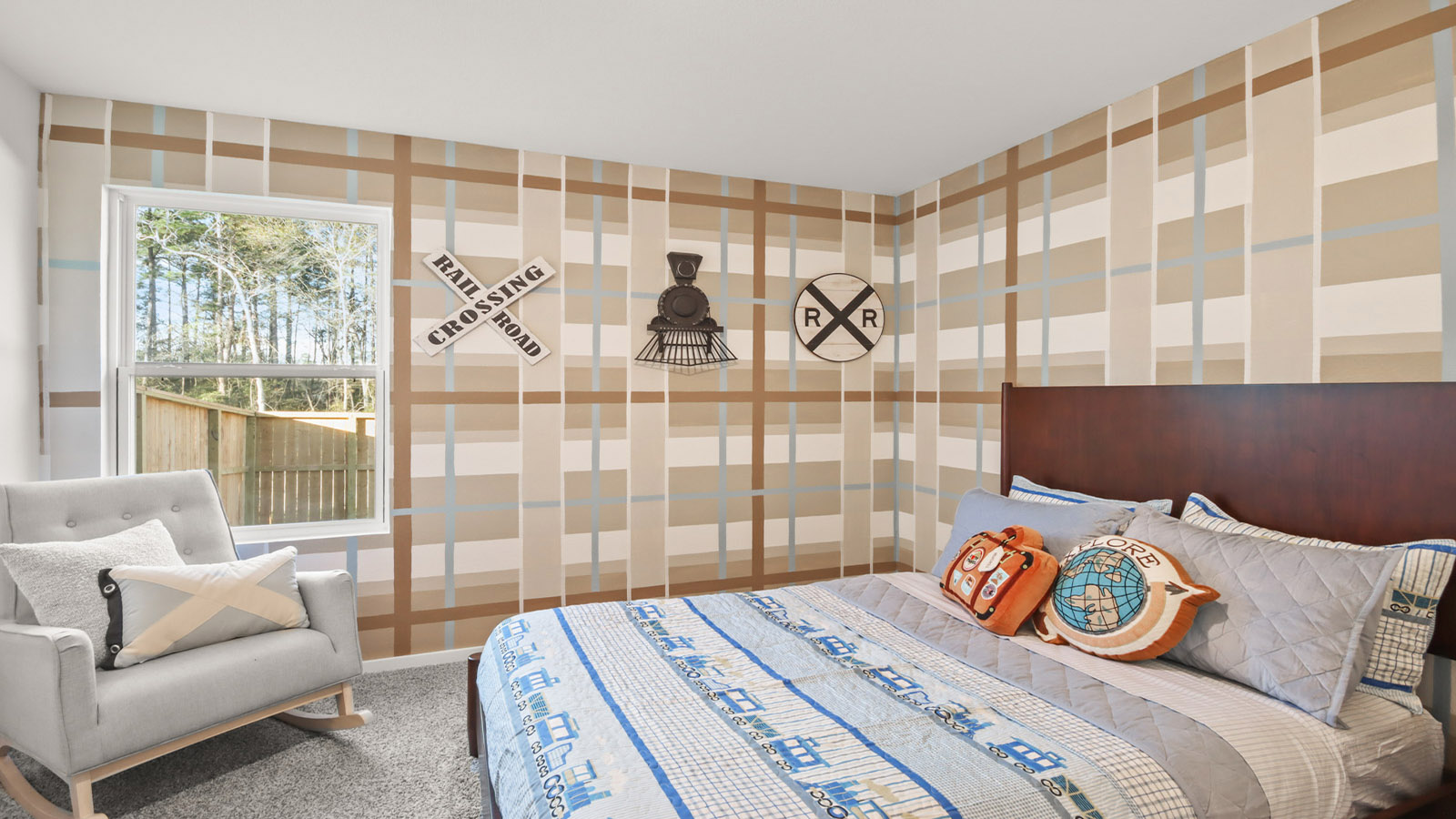 Secondary bedroom with shag carpet flooring and bright window