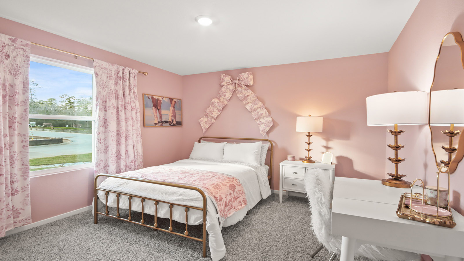 Secondary bedroom with shag carpet flooring and bright window